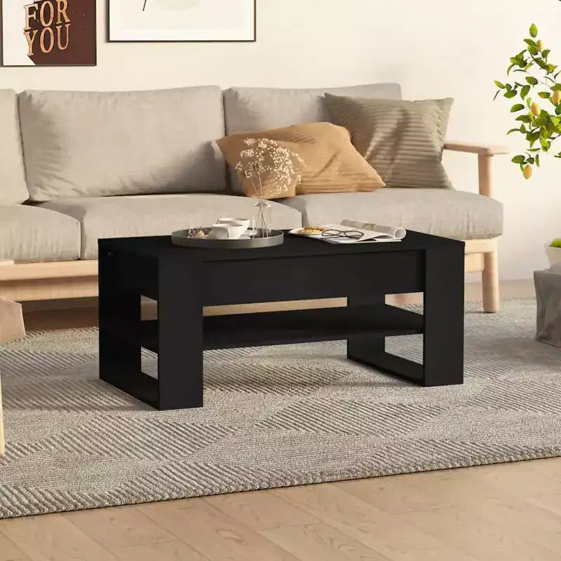 Table basse noire de taille moyenne en bois d’ingénierie