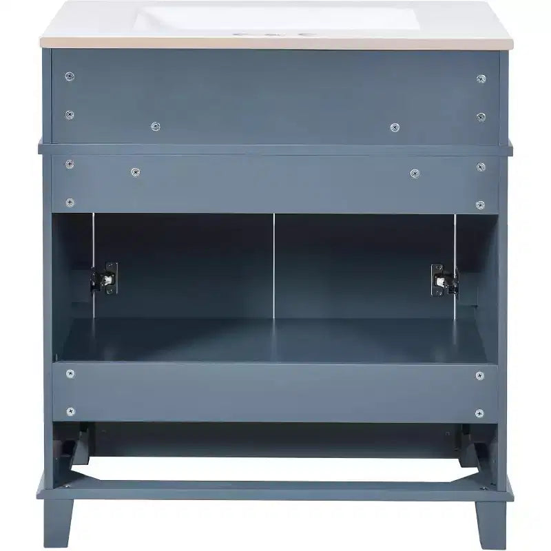 Mueble de baño blanco con lavabo