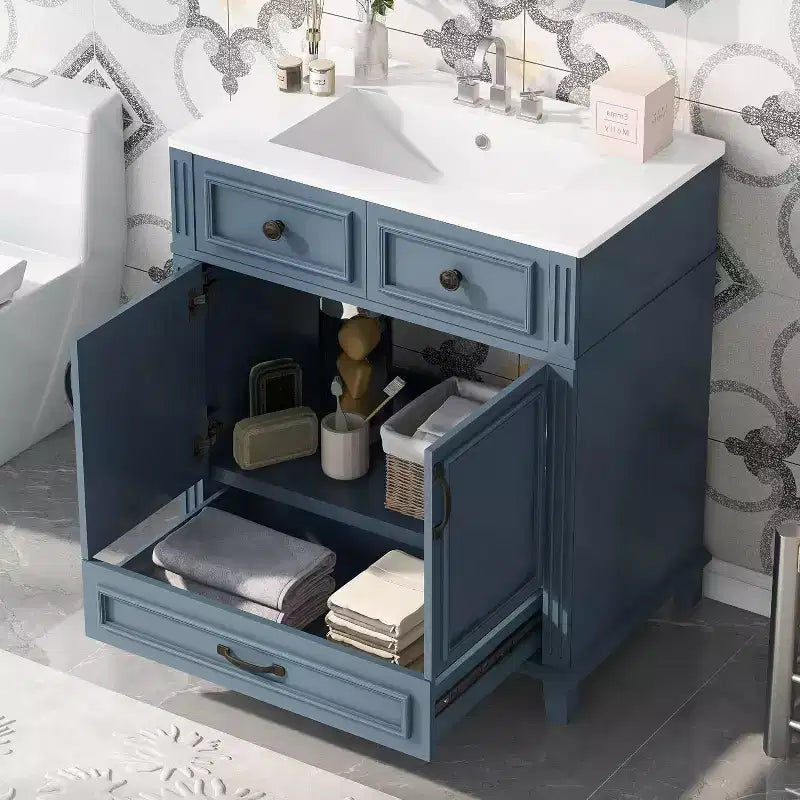Mueble de baño blanco con lavabo